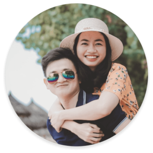 A man giving a woman a piggy back ride